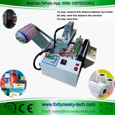 Electric eye cutting machine for smart phone membrane label barcode ()